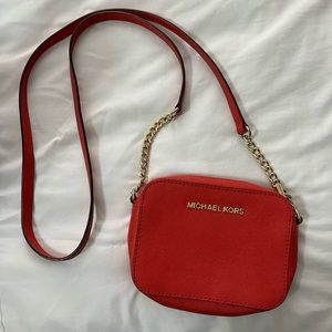 Red Michael Kor’s purse